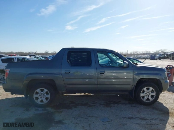 2007 Honda Ridgeline RTL w/Leather with VIN 2HJYK16547H526249, listed as a IAAI auction lot 41769625 with 173,168 mi miles. Bid and sale history available at carsss.com. Image 13.