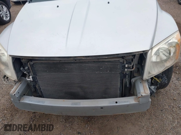 2009 Dodge Caliber SXT with VIN 1B3HB48A59D143888, listed as a IAAI auction lot 42110334 with 182,674 mi miles and . Bid and sale history available at DreamBid. Image 13.