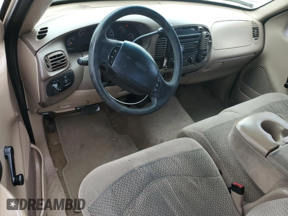 1999 Ford F-150 with VIN 1FTZX1721XNA37541, listed as a Copart auction lot 51588415 with 267,071 mi miles and Salvage title. Bid and sale history available at DreamBid. Image 8.