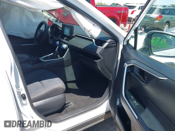 2019 Toyota RAV4 Hybrid LE with VIN 2T3MWRFV2KW026931, listed as a IAAI auction lot 42667582 with 93,147 mi miles and . Bid and sale history available at DreamBid. Image 5.
