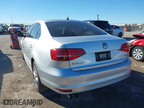 2015 Volkswagen Jetta SE z VIN 3VWD07AJ6FM326731, wystawiony jako IAAI lot #41066250 z przebiegiem 63 242 mil mil oraz . Historia ofert i sprzedaży dostępna na DreamBid. Obrazek 3.