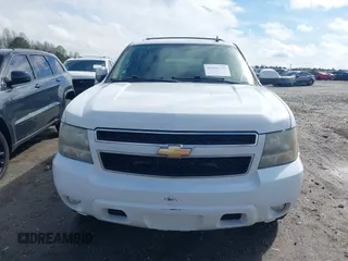2011 Chevrolet Suburban LT with VIN 1GNSCJE01BR291466, listed as a IAAI auction lot 41800799 with 232,542 mi miles. Bid and sale history available at carsss.com. Image 12.