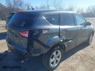 2016 Ford Escape SE with VIN 1FMCU9GX9GUC37108, listed as a IAAI auction lot 41543684 with 116,827 mi miles. Bid and sale history available at carsss.com. Image 4.