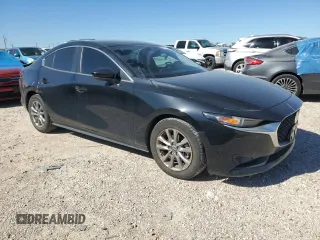 2021 Mazda 3 2.0 with VIN JM1BPAA73M1334402, listed as a Copart auction lot 79271134 with 27,338 mi miles and Salvage Title. Bid and sale history available at DreamBid. Image 4.