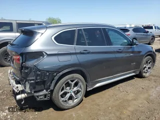 2018 BMW X1 sDrive28i with VIN WBXHU7C31J5L05441, listed as a Copart auction lot 49420595 with 115,003 mi miles and Salvage Title. Bid and sale history available at carsss.com. Image 3.