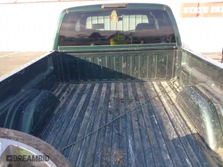 2004 Chevrolet Silverado 1500 LS with VIN 2GCEC19TX41181148, listed as a IAAI auction lot 41676935 with 184,173 mi miles. Bid and sale history available at carsss.com. Image 18.