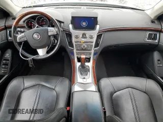 2013 Cadillac CTS Premium with VIN 1G6DS5E35D0149394, listed as a Copart auction lot 77005854 with 92,197 mi miles and Salvage title. Bid and sale history available at DreamBid. Image 8.
