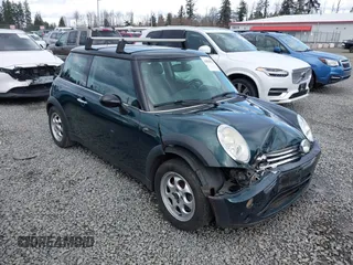 2006 MINI Hardtop with VIN WMWRC33516TK67711, listed as a IAAI auction lot 41825513 with 174,012 mi miles and . Bid and sale history available at DreamBid. Image 1.