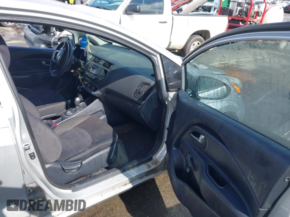 2014 Kia Rio LX with VIN KNADM4A31E6413780, listed as a IAAI auction lot 41996928 with 93,446 mi miles and . Bid and sale history available at DreamBid. Image 5.