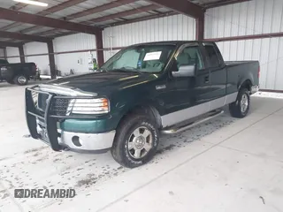 2007 Ford F-150 STX with VIN 1FTRX14W87NA17276, listed as a IAAI auction lot 41853941 with 302,030 mi miles. Bid and sale history available at carsss.com. Image 2.