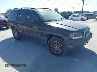 2004 Jeep Grand Cherokee Laredo with VIN 1J4GW48S74C401022, listed as a IAAI auction lot 41982319 with 170,607 mi miles. Bid and sale history available at carsss.com. Image 1.