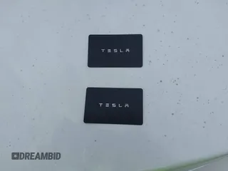 2021 Tesla Model 3 Long Range z VIN 5YJ3E1EB7MF979988, wystawiony jako IAAI lot #40893463 z przebiegiem 38 230 mil mil oraz . Historia ofert i sprzedaży dostępna na DreamBid. Obrazek 11.