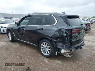 2021 BMW X5 xDrive45e with VIN 5UXTA6C02M9F88978, listed as a IAAI auction lot 42201563 with 23,339 mi miles and . Bid and sale history available at DreamBid. Image 3.