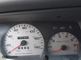 2003 Mercury Marauder with VIN 2MEHM75V33X674412, listed as a IAAI auction lot 41879734 with 181,984 mi miles. Bid and sale history available at carsss.com. Image 7.