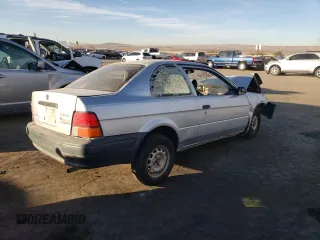 1996 Toyota Tercel DX z VIN JT2AC52L2T0193281, wystawiony jako Copart lot #85787774 z przebiegiem Nie podano mil oraz Szkody całkowita. Historia ofert i sprzedaży dostępna na DreamBid. Obrazek 3.