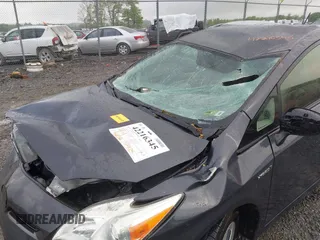 2015 Toyota Prius Four z VIN JTDKN3DU2F0439833, wystawiony jako IAAI lot #42216345 z przebiegiem 96 872 mil mil oraz . Historia ofert i sprzedaży dostępna na DreamBid. Obrazek 6.