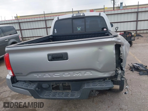 2017 Toyota Tacoma SR with VIN 5TFAX5GN6HX083614, listed as a IAAI auction lot 42314254 with 104,407 mi miles and . Bid and sale history available at DreamBid. Image 17.