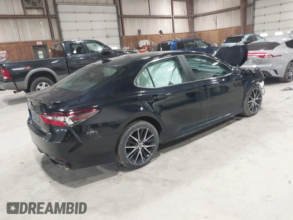 2021 Toyota Camry SE Nightshade with VIN 4T1T11AK2MU483971, listed as a IAAI auction lot 41934957 with 61,618 mi miles and . Bid and sale history available at DreamBid. Image 4.