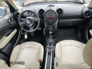 2015 MINI Countryman S with VIN WMWZC5C56FWP47995, listed as a Copart auction lot 55924945 with 46,825 mi miles and Salvage Title. Bid and sale history available at DreamBid. Image 8.