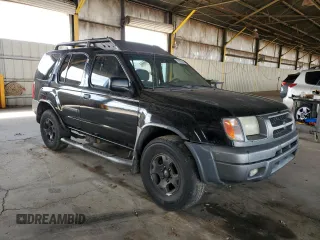 2001 Nissan Xterra XE with VIN 5N1ED28T81C560655, listed as a Copart auction lot 51832515 with 224,208 mi miles and Clean title. Bid and sale history available at DreamBid. Image 4.
