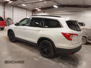 2021 Honda Pilot Special Edition with VIN 5FNYF6H2XMB054312, listed as a IAAI auction lot 41828508 with 115,652 mi miles and . Bid and sale history available at DreamBid. Image 3.