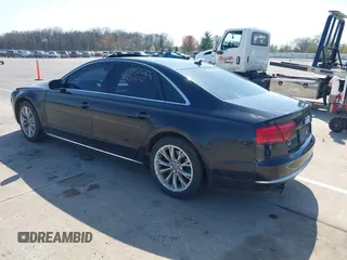 2011 Audi A8 with VIN WAUAVAFD5BN022388, listed as a IAAI auction lot 42102765 with 141,865 mi miles and . Bid and sale history available at DreamBid. Image 3.