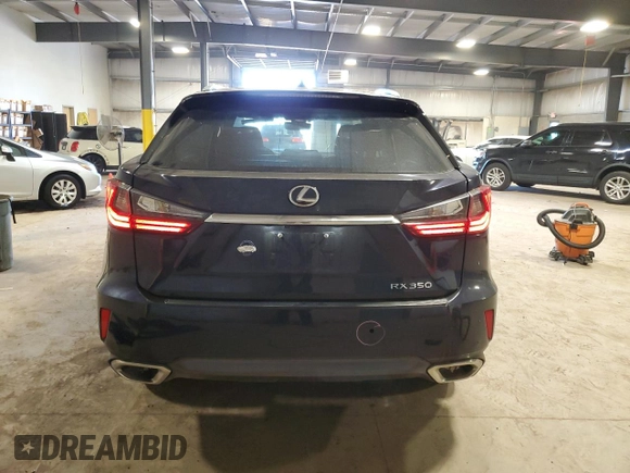 2018 Lexus RX 350 with VIN 2T2BZMCA8JC154579, listed as a Copart auction lot 54215705 with 73,700 mi miles and Salvage title. Bid and sale history available at DreamBid. Image 6.