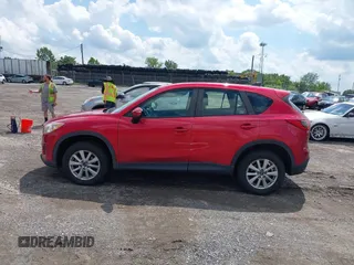 2015 Mazda CX-5 Sport with VIN JM3KE4BY5F0502121, listed as a IAAI auction lot 42652276 with 192,462 mi miles and . Bid and sale history available at DreamBid. Image 14.