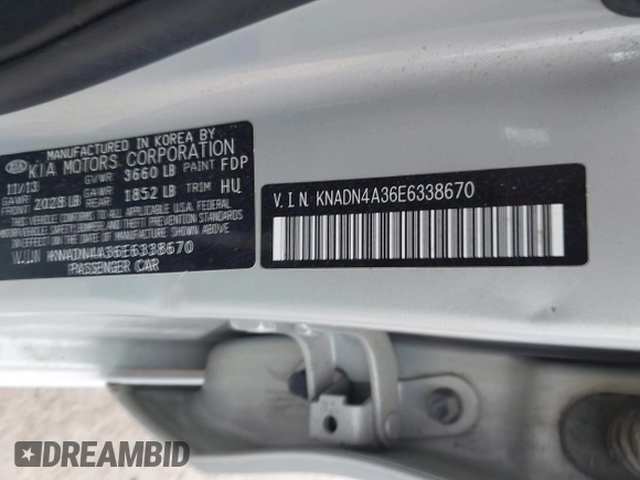 2014 Kia Rio EX with VIN KNADN4A36E6338670, listed as a IAAI auction lot 42035501 with 166,561 mi miles. Bid and sale history available at carsss.com. Image 9.