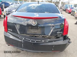 2013 Cadillac ATS z VIN 1G6AA5RX9D0167867, wystawiony jako IAAI lot #41945699 z przebiegiem 166 040 mil mil oraz . Historia ofert i sprzedaży dostępna na DreamBid. Obrazek 16.
