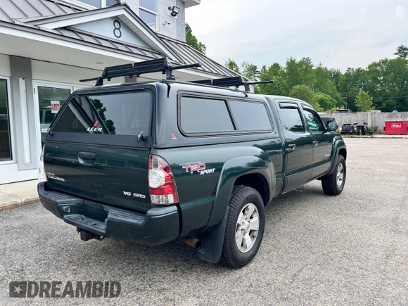 2009 Toyota Tacoma with VIN 3TMMU52N99M009737, listed as a Copart auction lot 60346815 with 216,703 mi miles and Clean title. Bid and sale history available at DreamBid. Image 4.