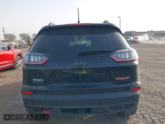 2019 Jeep Cherokee Trailhawk Elite with VIN 1C4PJMBX4KD385796, listed as a IAAI auction lot 41557577 with 55,700 mi miles. Bid and sale history available at carsss.com. Image 16.