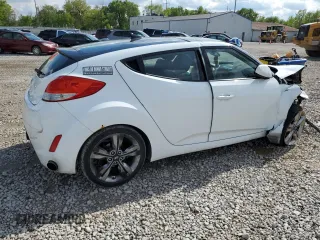 2016 Hyundai Veloster z VIN KMHTC6AD2GU272413, wystawiony jako Copart lot #55530805 z przebiegiem Nie podano mil oraz Szkoda całkowita • Salvage title. Historia ofert i sprzedaży dostępna na DreamBid. Obrazek 3.