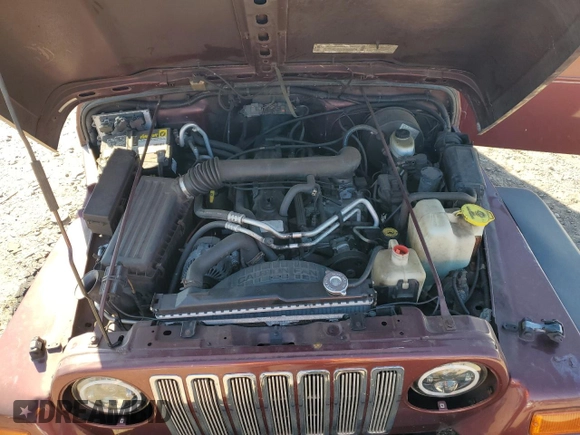 2002 Jeep Wrangler Sahara with VIN 1J4FA59S22P704603, listed as a Copart auction lot 77554334 with 99,758 mi miles and Salvage Title. Bid and sale history available at carsss.com. Image 12.