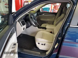 2023 Volkswagen Atlas SE z VIN 1V2HR2CA5PC527628, wystawiony jako IAAI lot #42569146 z przebiegiem 27 424 mil mil oraz . Historia ofert i sprzedaży dostępna na DreamBid. Obrazek 27.