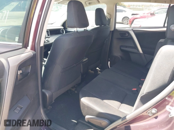 2016 Toyota RAV4 LE with VIN 2T3ZFREV8GW310580, listed as a IAAI auction lot 42063071 with 104,099 mi miles and . Bid and sale history available at DreamBid. Image 8.
