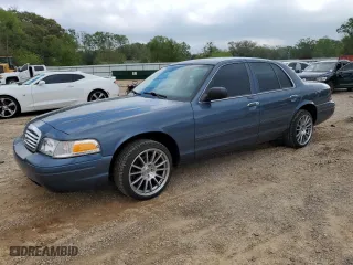 2009 Ford Crown Victoria LX with VIN 2FAHP74V79X124042, listed as a Copart auction lot 50974145 with 115,223 mi miles and Salvage Title. Bid and sale history available at carsss.com. Image 1.