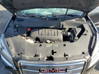 2014 GMC Acadia Denali z VIN 1GKKVTKD8EJ269283, wystawiony jako Copart lot #54201065 z przebiegiem Nie podano mil oraz Szkoda całkowita • Salvage title. Historia ofert i sprzedaży dostępna na DreamBid. Obrazek 12.