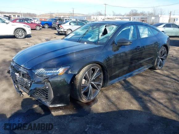 2021 Audi RS 7 z VIN WUAPCBF23MN903930, wystawiony jako IAAI lot #41669778 z przebiegiem 13 175 mil mil oraz . Historia ofert i sprzedaży dostępna na DreamBid. Obrazek 2.