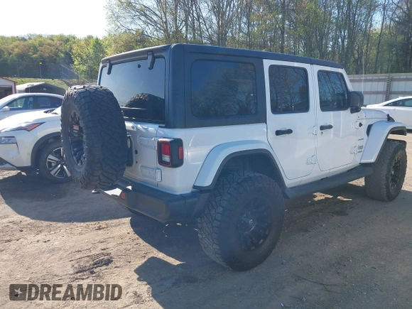 2019 Jeep Wrangler Unlimited Sahara with VIN 1C4HJXEN2KW591557, listed as a IAAI auction lot 41962034 with 88,691 mi miles and . Bid and sale history available at DreamBid. Image 4.