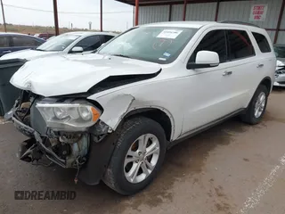 2013 Dodge Durango Crew with VIN 1C4RDHDG0DC535397, listed as a IAAI auction lot 41036306 with 163,571 mi miles. Bid and sale history available at carsss.com. Image 2.