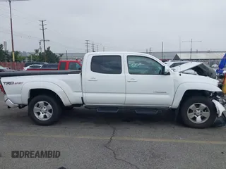 2015 Toyota Tacoma PreRunner with VIN 3TMKU4HN7FM043714, listed as a IAAI auction lot 42179707 with 151,092 mi miles and . Bid and sale history available at DreamBid. Image 14.