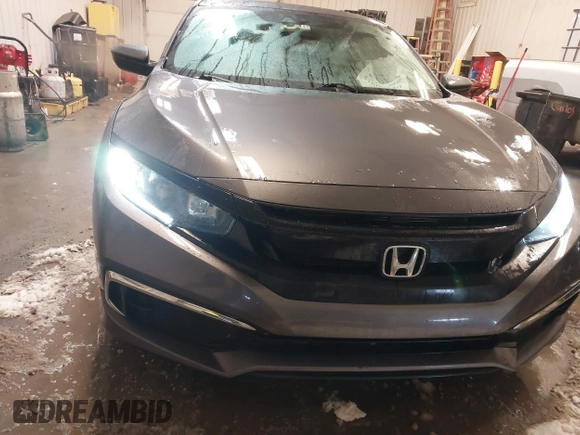 2020 Honda Civic LX z VIN 19XFC2F65LE030888, wystawiony jako IAAI lot #41609630 z przebiegiem 115 614 mil mil oraz . Historia ofert i sprzedaży dostępna na DreamBid. Obrazek 12.