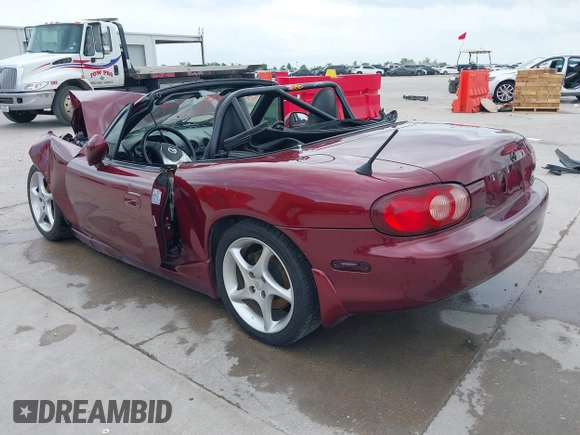 2003 Mazda MX-5 Miata Cloth with VIN JM1NB353130304852, listed as a IAAI auction lot 42145498 with Not provided miles and . Bid and sale history available at DreamBid. Image 3.