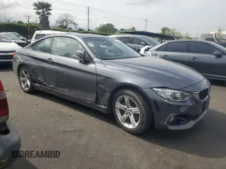 2015 BMW 4 Series 428i with VIN WBA3N3C57FK234685, listed as a Copart auction lot 52236575 with 115,093 mi miles and Salvage title. Bid and sale history available at DreamBid. Image 4.