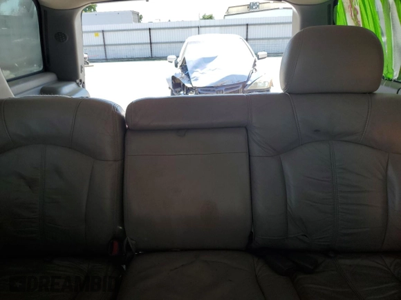 2001 Chevrolet Tahoe LT with VIN 1GNEC13T71R164164, listed as a Copart auction lot 60066165 with 234,506 mi miles and Salvage title. Bid and sale history available at DreamBid. Image 10.