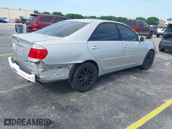 2005 Toyota Camry LE with VIN 4T1BE30K35U572110, listed as a IAAI auction lot 42674324 with 147,480 mi miles and . Bid and sale history available at DreamBid. Image 4.