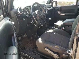 2011 Jeep Wrangler Sahara with VIN 1J4AA5D14BL542912, listed as a Copart auction lot 65158784 with 122,795 mi miles and Salvage Title. Bid and sale history available at DreamBid. Image 8.