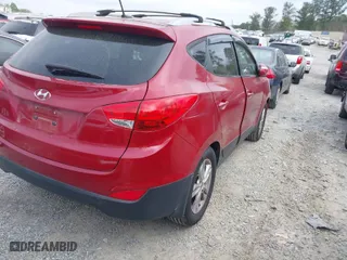 2012 Hyundai Tucson Limited with VIN KM8JU3ACXCU345113, listed as a IAAI auction lot 41946239 with 173,007 mi miles. Bid and sale history available at carsss.com. Image 4.