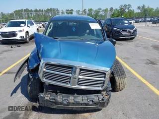 2005 Dodge Dakota SLT with VIN 1D7HW48N05S319621, listed as a IAAI auction lot 42037140 with 251,595 mi miles and . Bid and sale history available at DreamBid. Image 12.